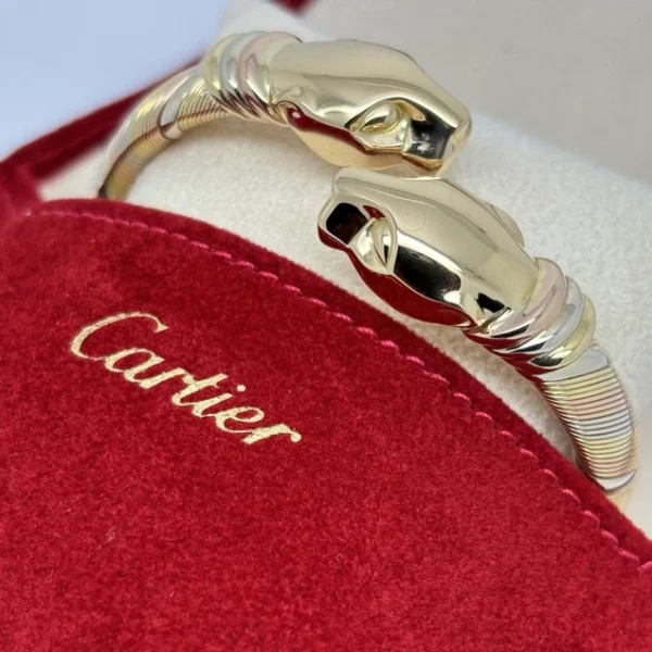 Bracelet cartier panthère cougar trinity en or jaune, blanc et rose 18 carats, service 2025