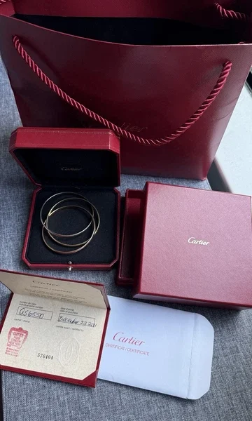 Bracelet jonc cartier trinity tricolore en or 18 carats, modèle classique