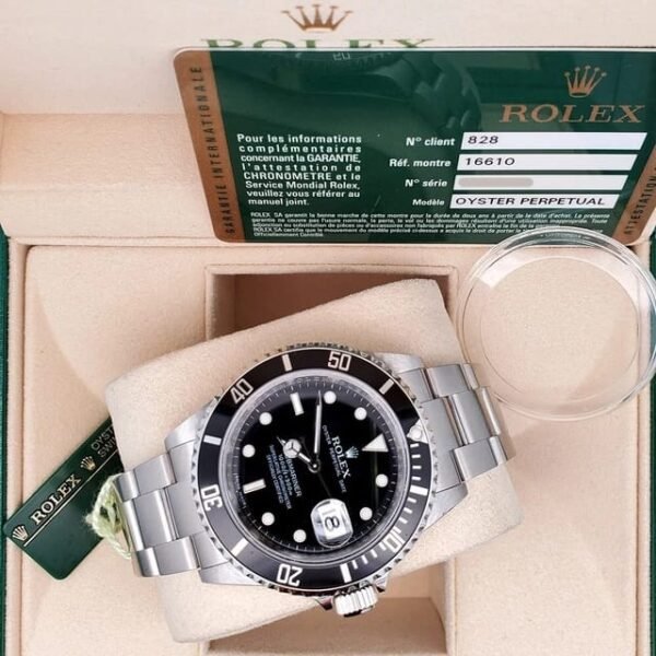 Rolex Submariner Date 40 mm Cadran noir Montre Oyster en acier 16610 Boîte Papiers